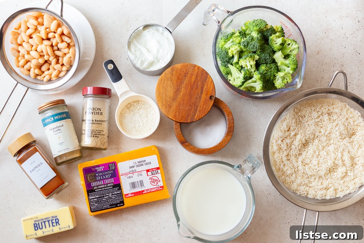 A collection of fresh ingredients laid out for Broccoli Cheese Rice Casserole