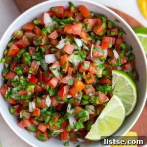 Crafting Perfect Pico de Gallo 9 pico de gallo in a white bowl with 2 limes on top