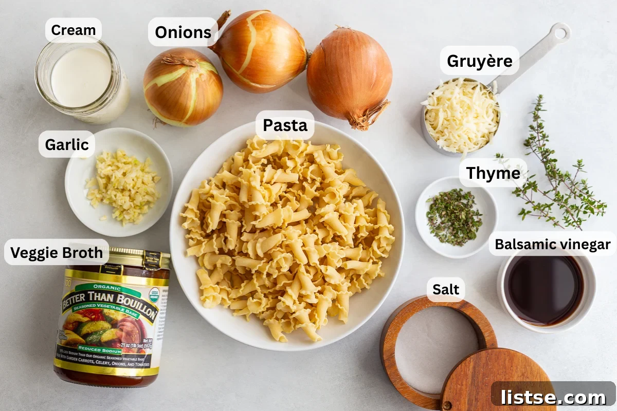 Ingredients for French onion pasta including pasta, yellow onions, minced garlic, heavy cream, fresh thyme, vegetable broth, and two types of cheese