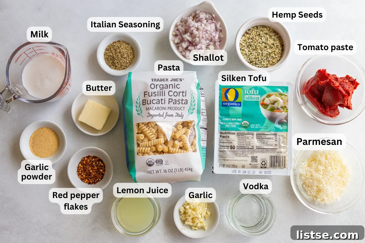 Creamy Tomato & Protein-Packed Pasta Recipe 4 ingredients to make high protein pasta: tomato paste, pasta, silken tofu, seasoning, parmesan, milk, shallot etc