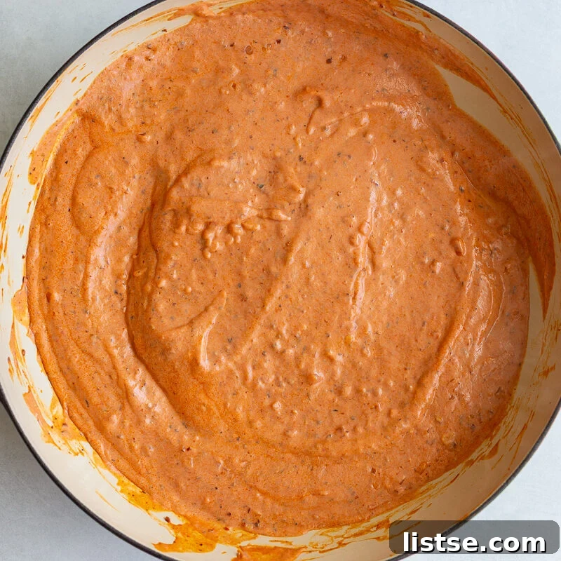 Creamy Tomato & Protein-Packed Pasta Recipe 8 creamt tomato tofu sauce in a large skillet