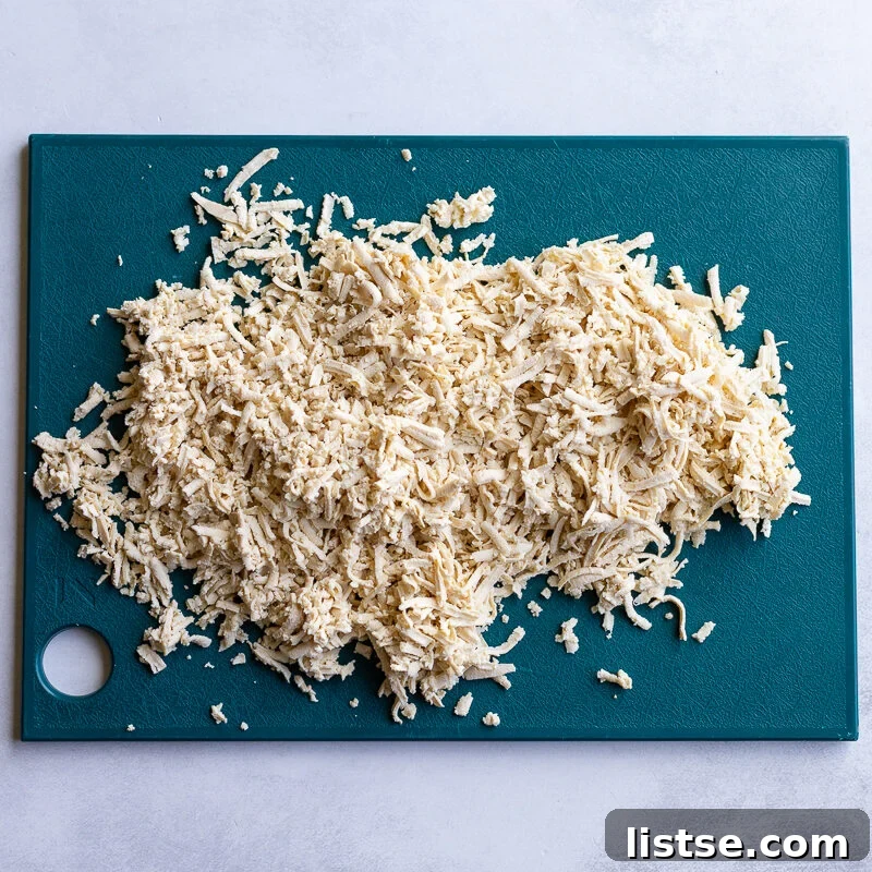 shredded tofu on a cutting board