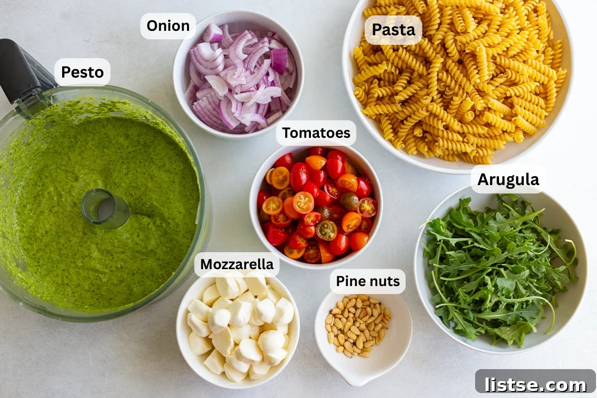 Pesto Pasta Salad with Cherry Tomatoes and Mozzarella 4 ingredients needed for pesto pasta salad including pasta, pesto, tomatoes, mozzarella and red onion