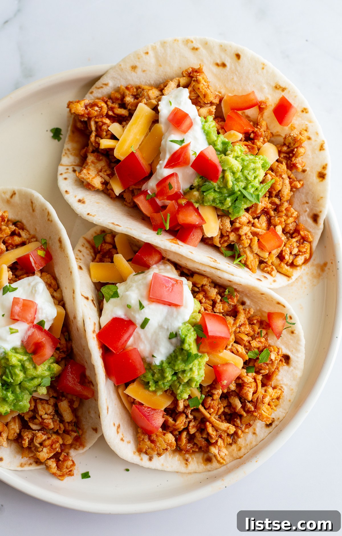 Tofu Ground Beef Recipe: Plant-Based Crumble for Any Dish 11 tofu tacos on a plate