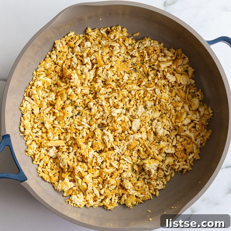 Tofu Ground Beef Recipe: Plant-Based Crumble for Any Dish 8 ground tofu crisping up in a skillet