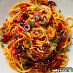 pasta alla puttanesca on a large plate